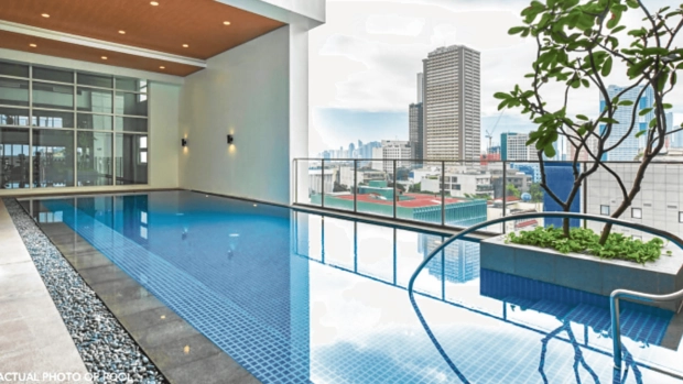 The Suites offer an indoor swimming pool with a view of the city.